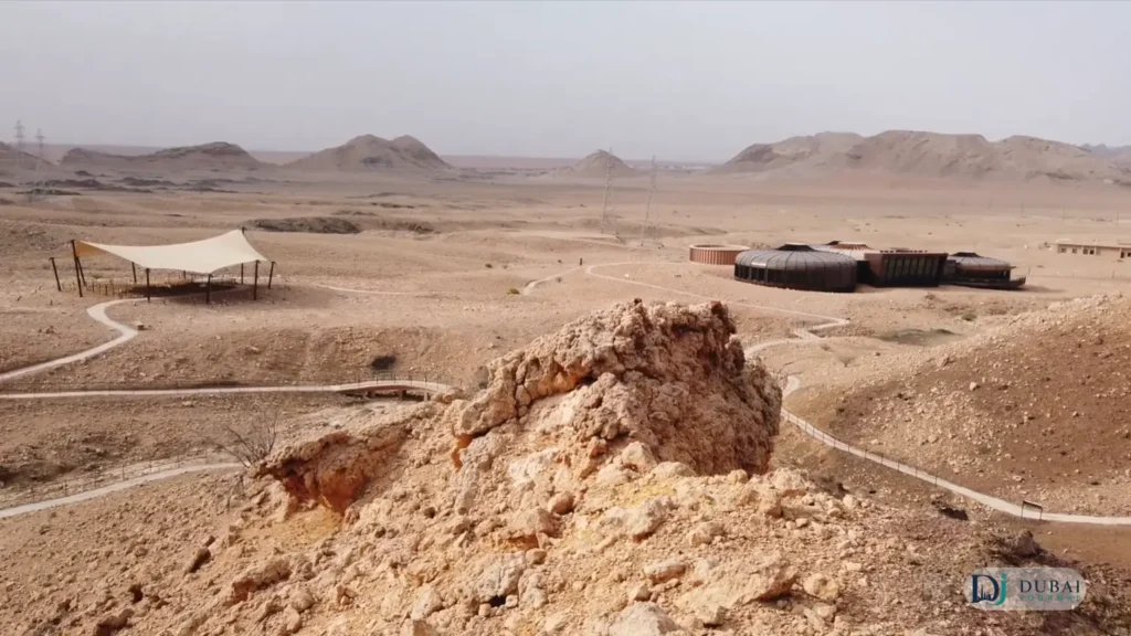 Aerial view of Buhais Geological Park's star-shaped museum pods and desert trails