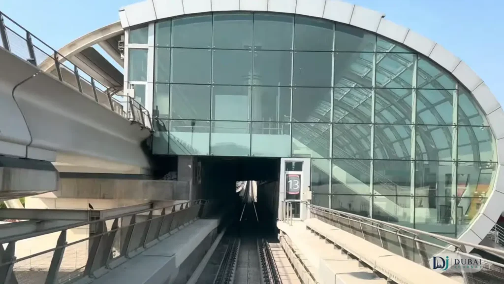 Dubai Metro Airport Terminal 3 station with Emirates aircraft