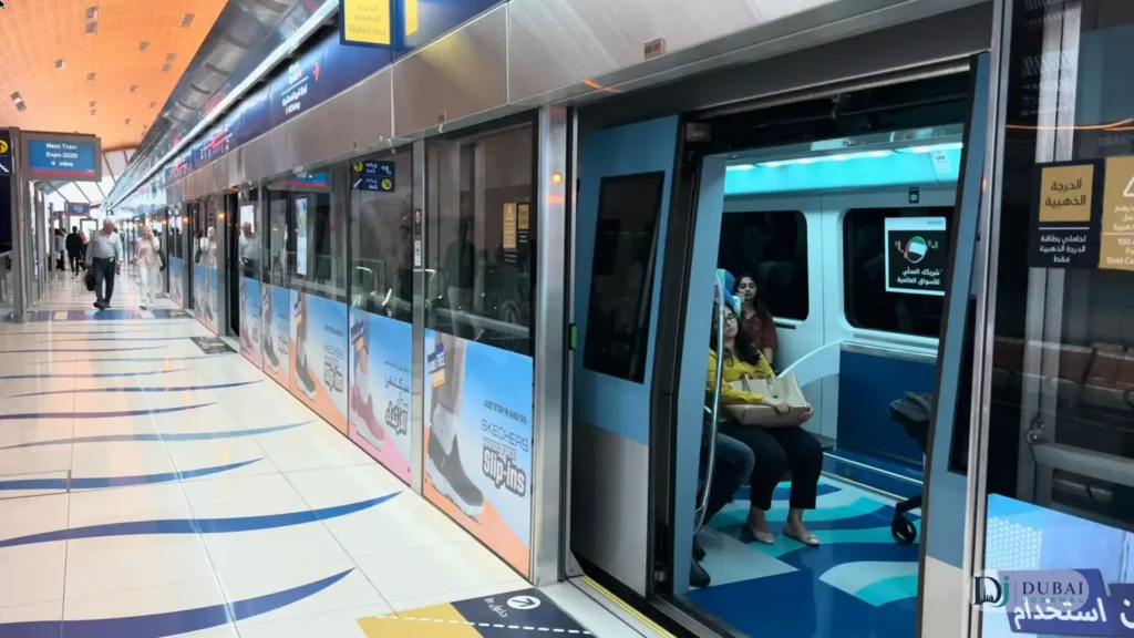 Dubai Metro Red Line train at a station platform with doors open