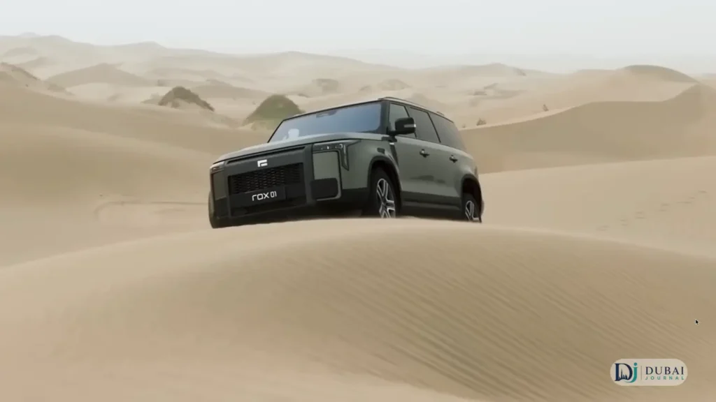 ROX 01 driving over desert dunes in the UAE