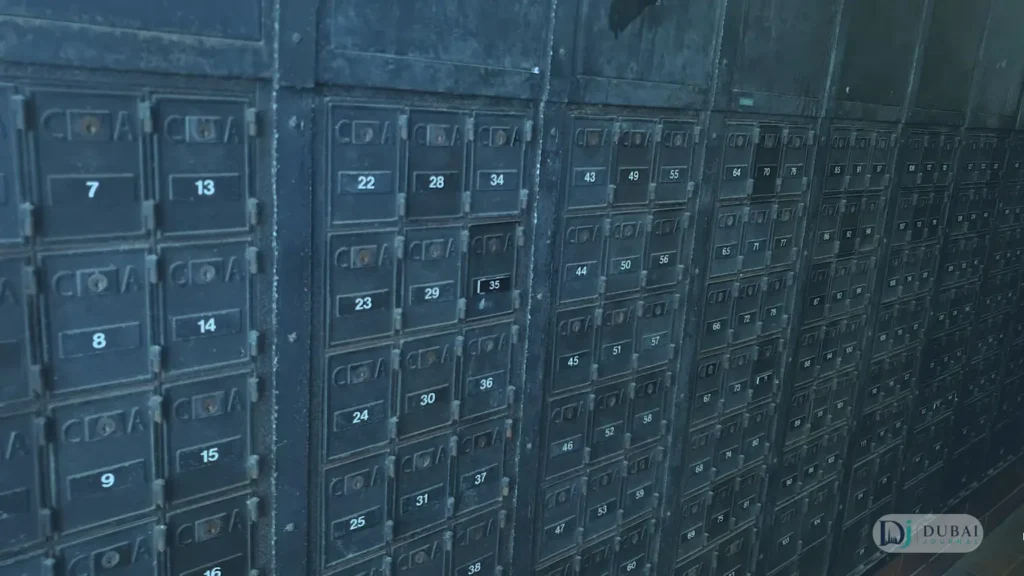 Wall of numbered PO Box compartments at a post office